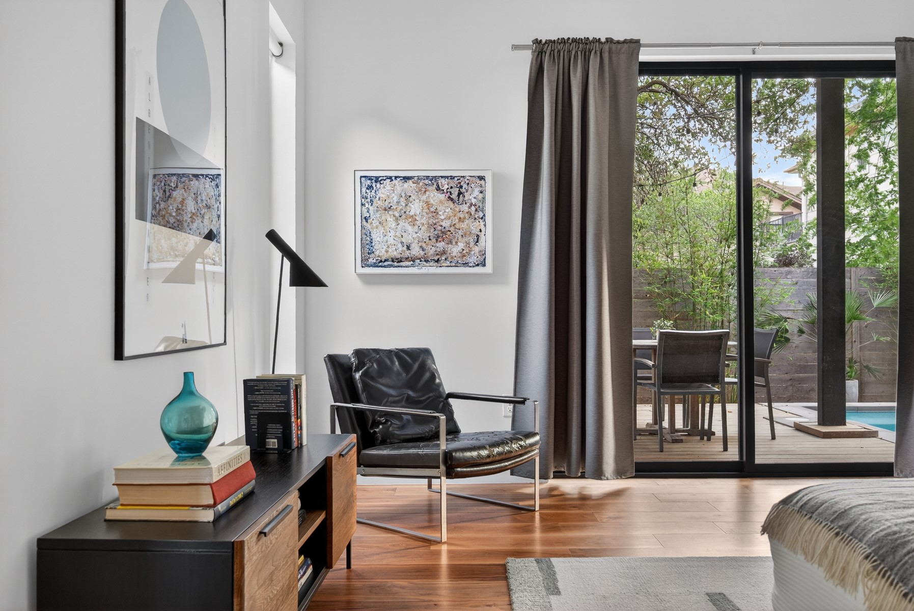 1605 Chelsea Lane, Unit 1 Austin, TX 78704 - Photo 18 of 39 a living room with furniture and a floor to ceiling window