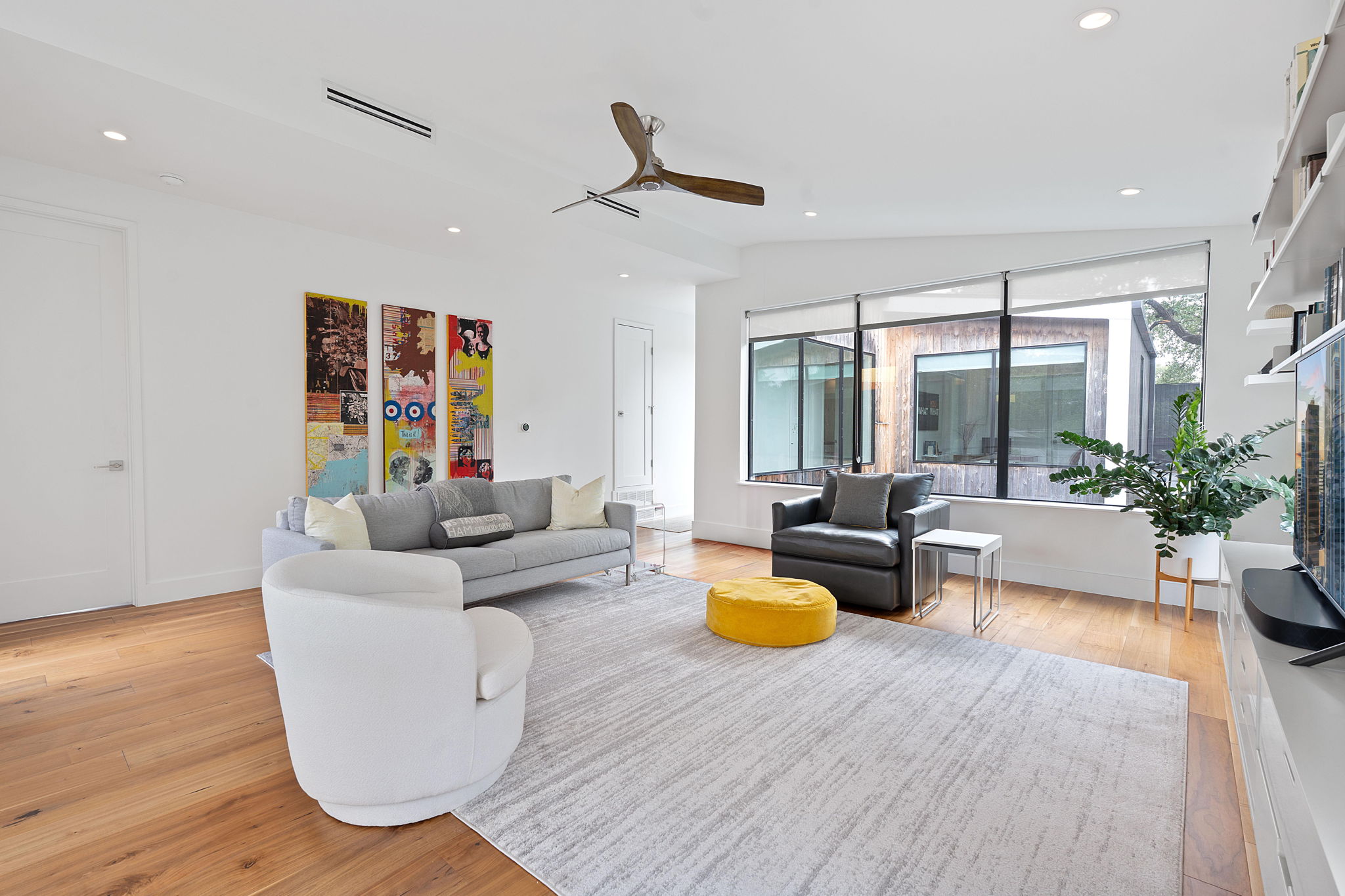 1605 Chelsea Lane, Unit 1 Austin, TX 78704 - Photo 19 of 38 Living room with ceiling fan, light wood finished floors, and recessed lighting