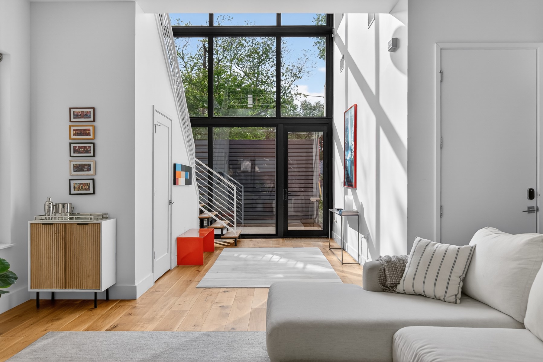 1605 Chelsea Lane, Unit 1 Austin, TX 78704 - Photo 2 of 39 a living room with furniture and a window