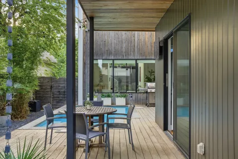 a view of a couches on the roof deck