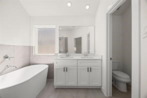 8311 Amber Summit Lane Angleton, TX 77515 - Photo 11 of 12 PRIMARY BATHROOM PARTIAL VIEW