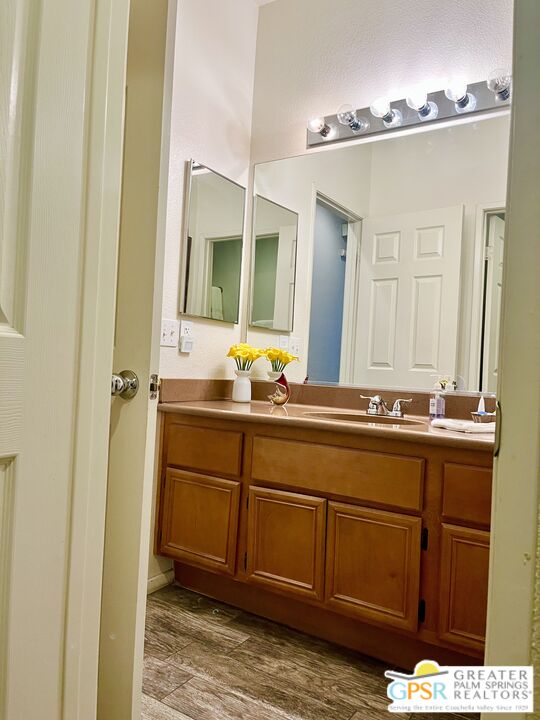 83680 Jaderock Road Coachella, CA 92236 - Photo 13 of 41 a bathroom with a sink and a mirror