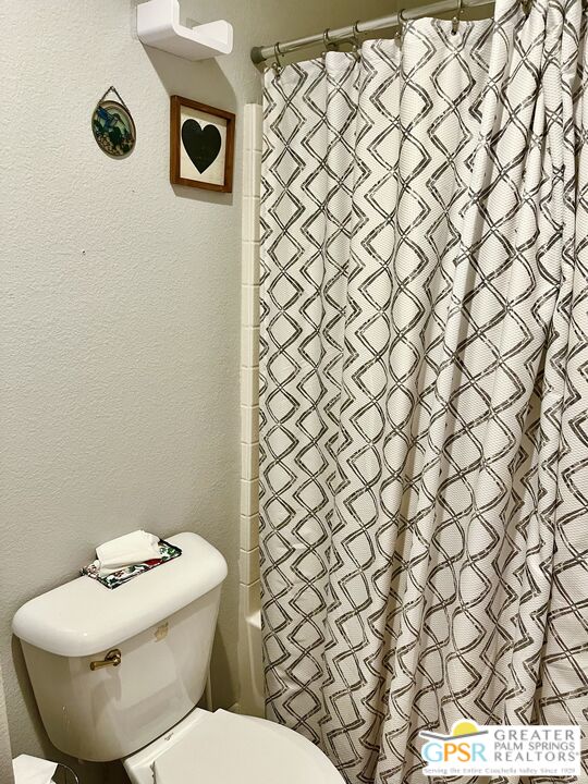 83680 Jaderock Road Coachella, CA 92236 - Photo 15 of 41 a white toilet sitting next to a white wall