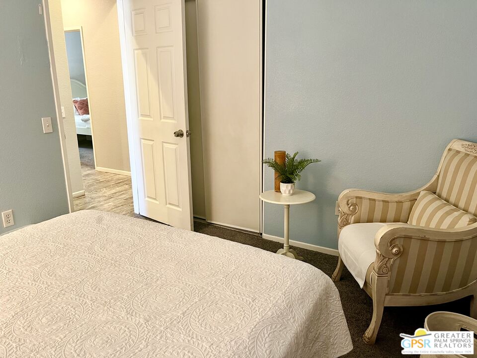 83680 Jaderock Road Coachella, CA 92236 - Photo 24 of 41 a bedroom with a bed and a couch