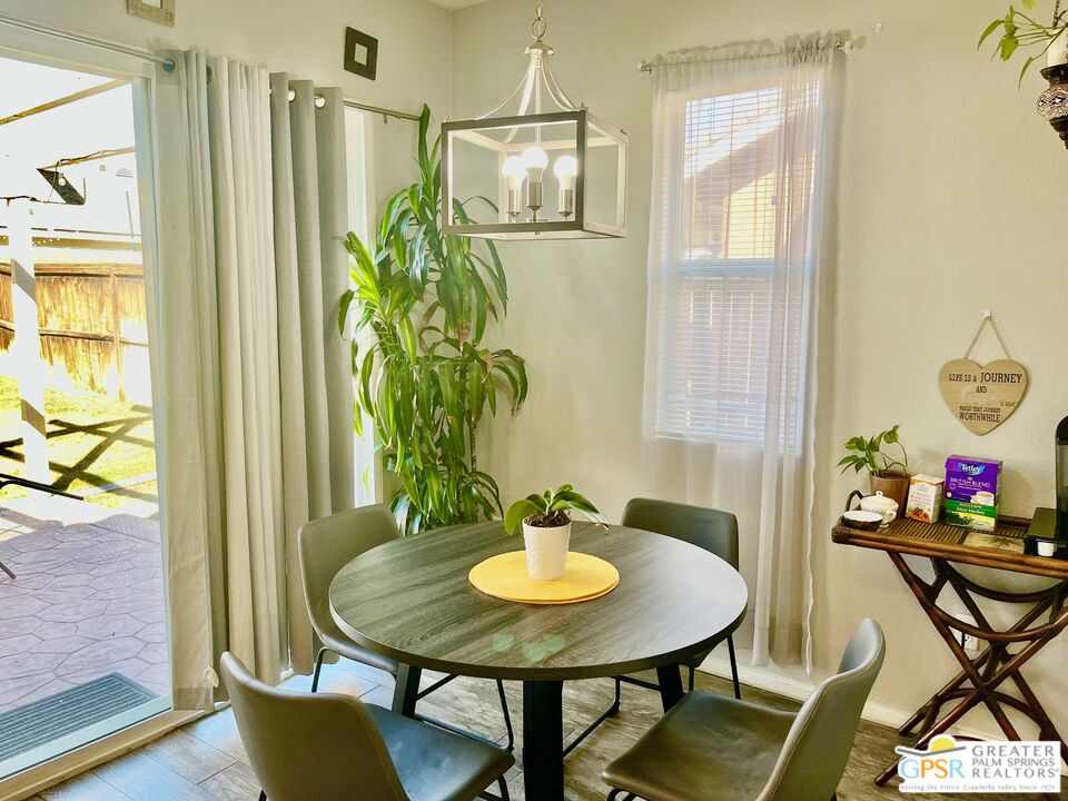 83680 Jaderock Road Coachella, CA 92236 - Photo 7 of 41 a view of a dining room with furniture and a window