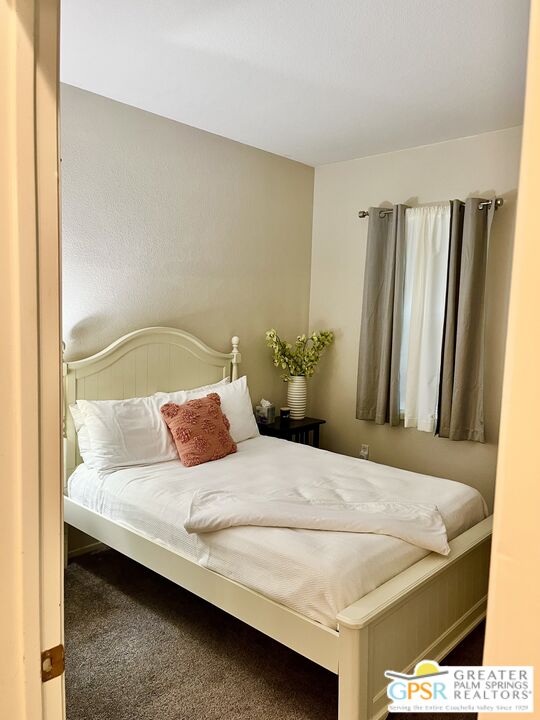83680 Jaderock Road Coachella, CA 92236 - Photo 10 of 41 a bedroom with a bed and a window