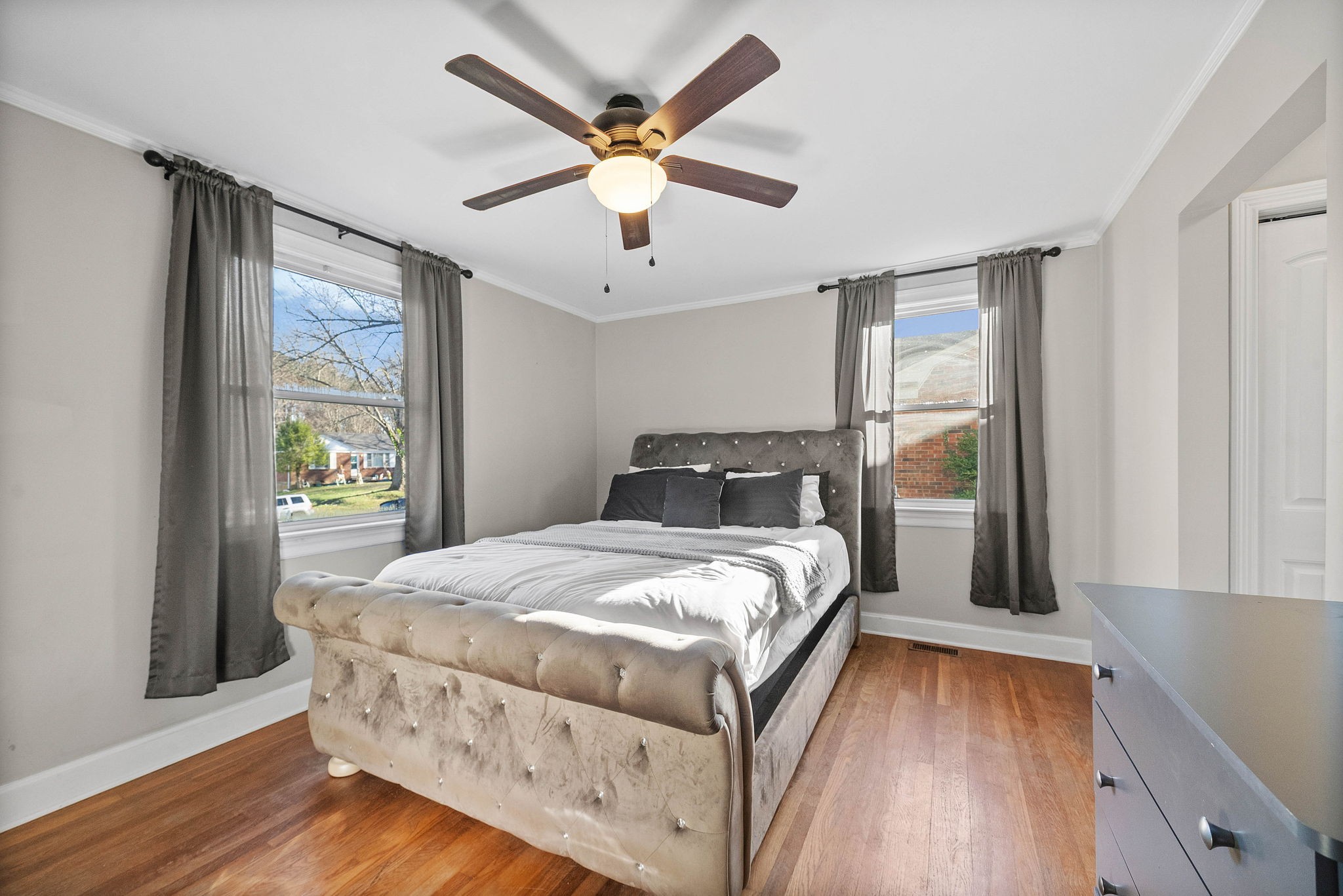 1673 Valley Road Clarksville, TN 37043 - Photo 15 of 33 a bedroom with a large bed and a large window