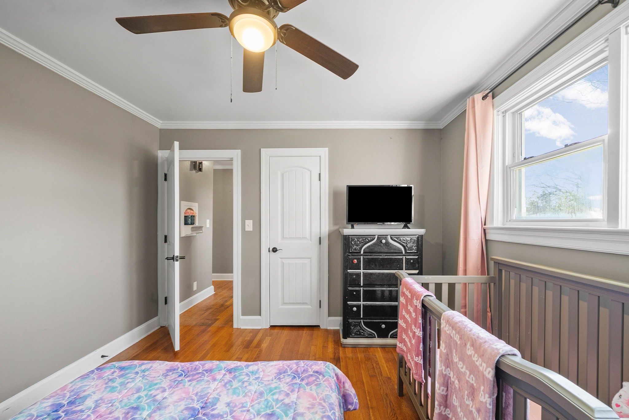 1673 Valley Road Clarksville, TN 37043 - Photo 21 of 33 a bedroom with furniture and a flat screen tv