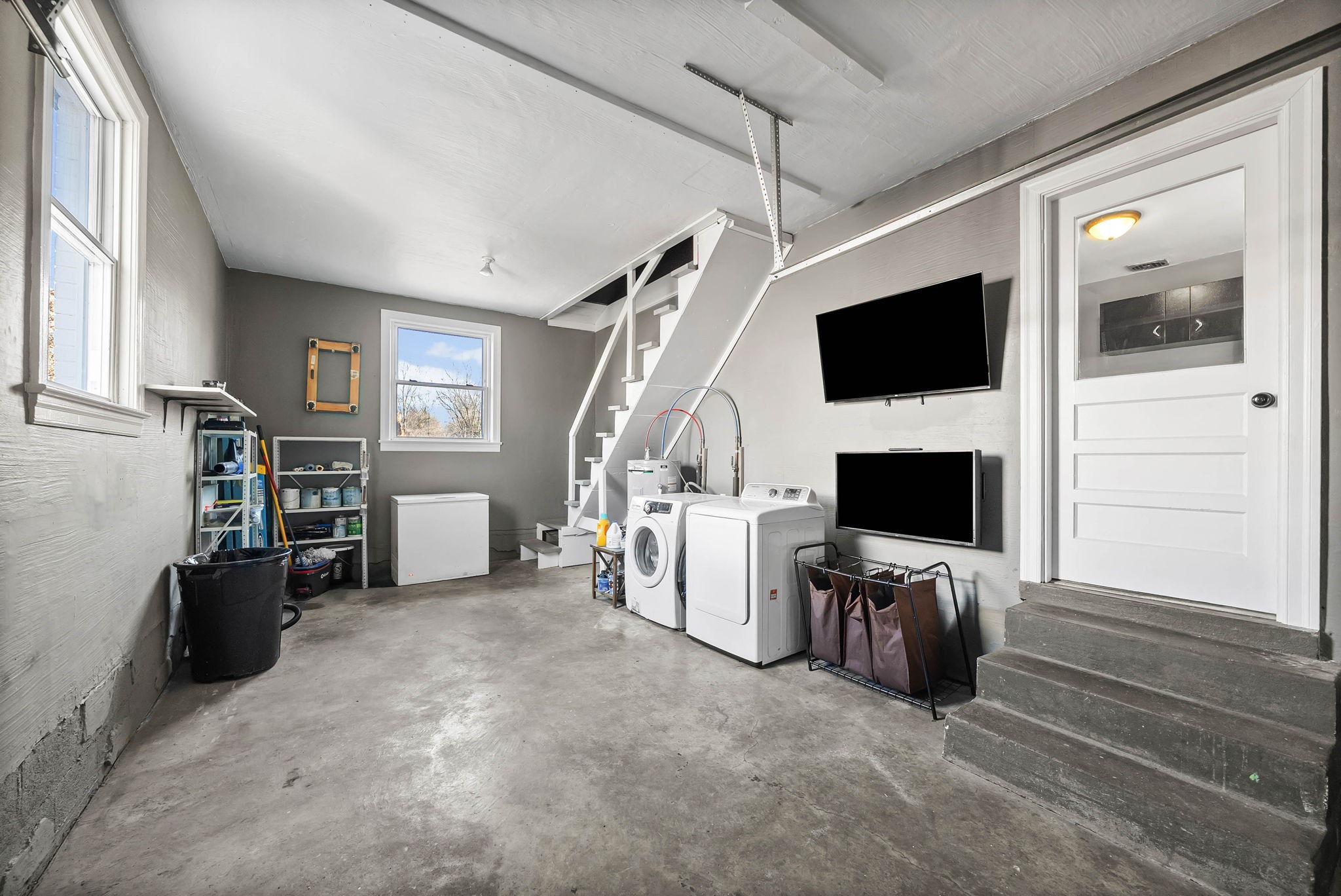 1673 Valley Road Clarksville, TN 37043 - Photo 24 of 33 a view of a livingroom with furniture and a flat screen tv