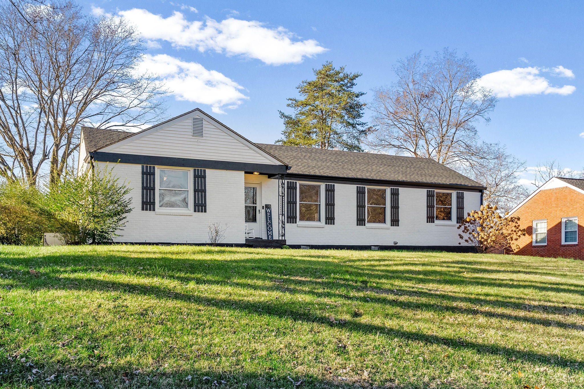 1673 Valley Road Clarksville, TN 37043 - Photo 4 of 33 a front view of a house with a yard