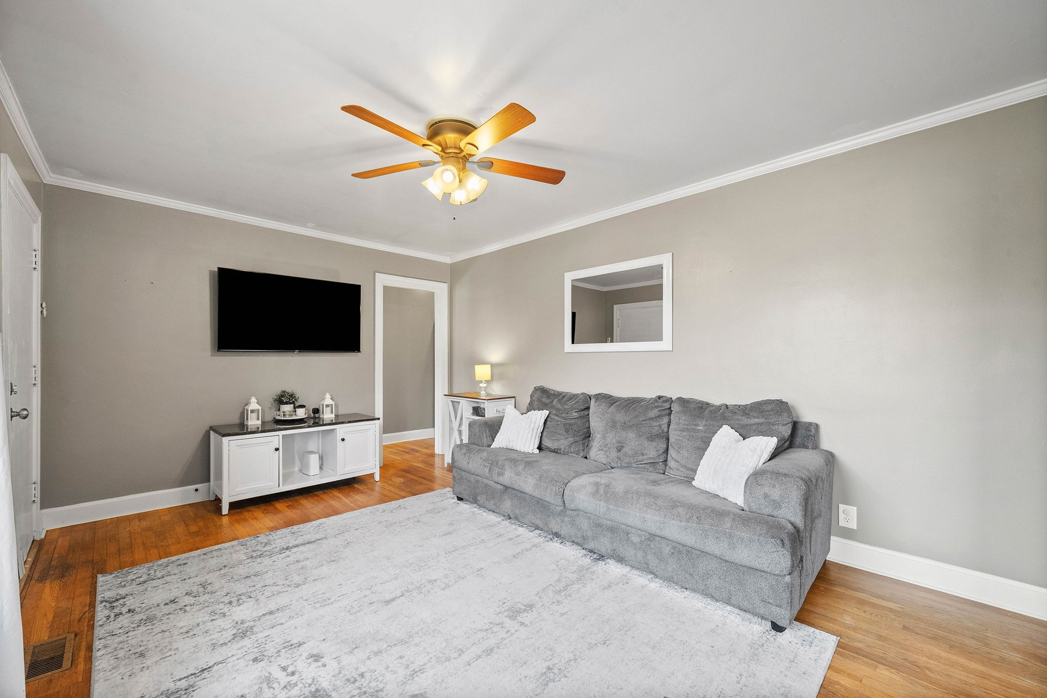 1673 Valley Road Clarksville, TN 37043 - Photo 7 of 33 a living room with furniture and a flat screen tv
