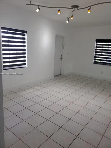 a view of a room & window