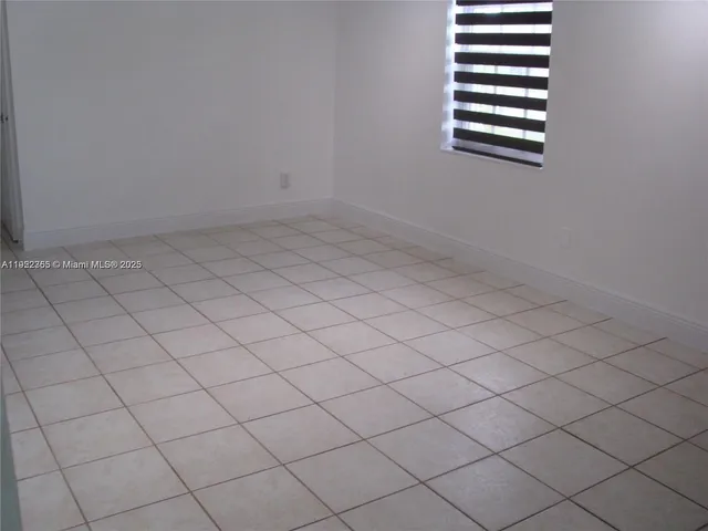 a view of a room and window