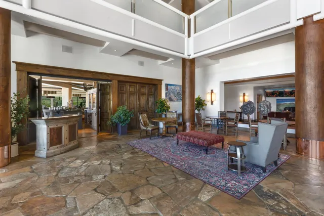 a view of a living room and a livingroom with furniture