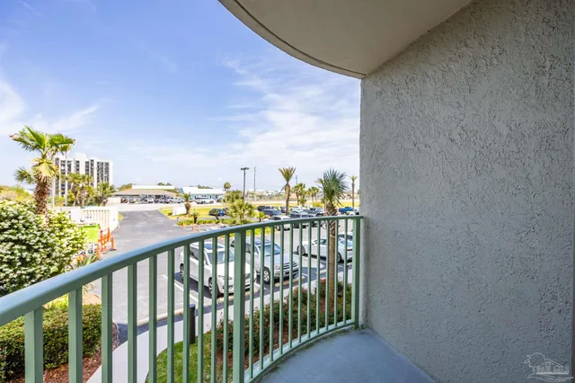 a view of a bedroom from a hallway