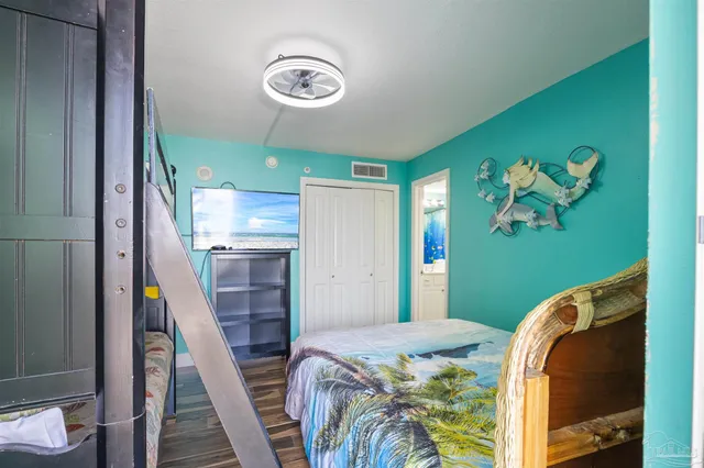 a bathroom with a shower and a mirror