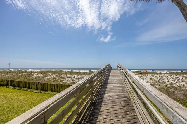 a view of swimming pool from a balcony