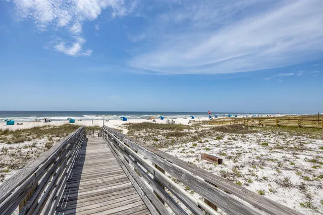 an outdoor living room with furniture