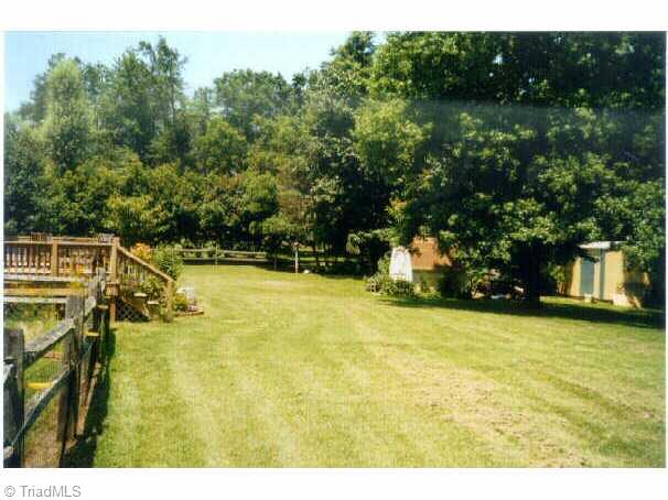 3609 Fieldview Road Pleasant Garden, NC 27313 - Photo 6 of 8 Other. Plenty of room for pets and people! This nice back yard is fenced with a buffer of trees in the back.