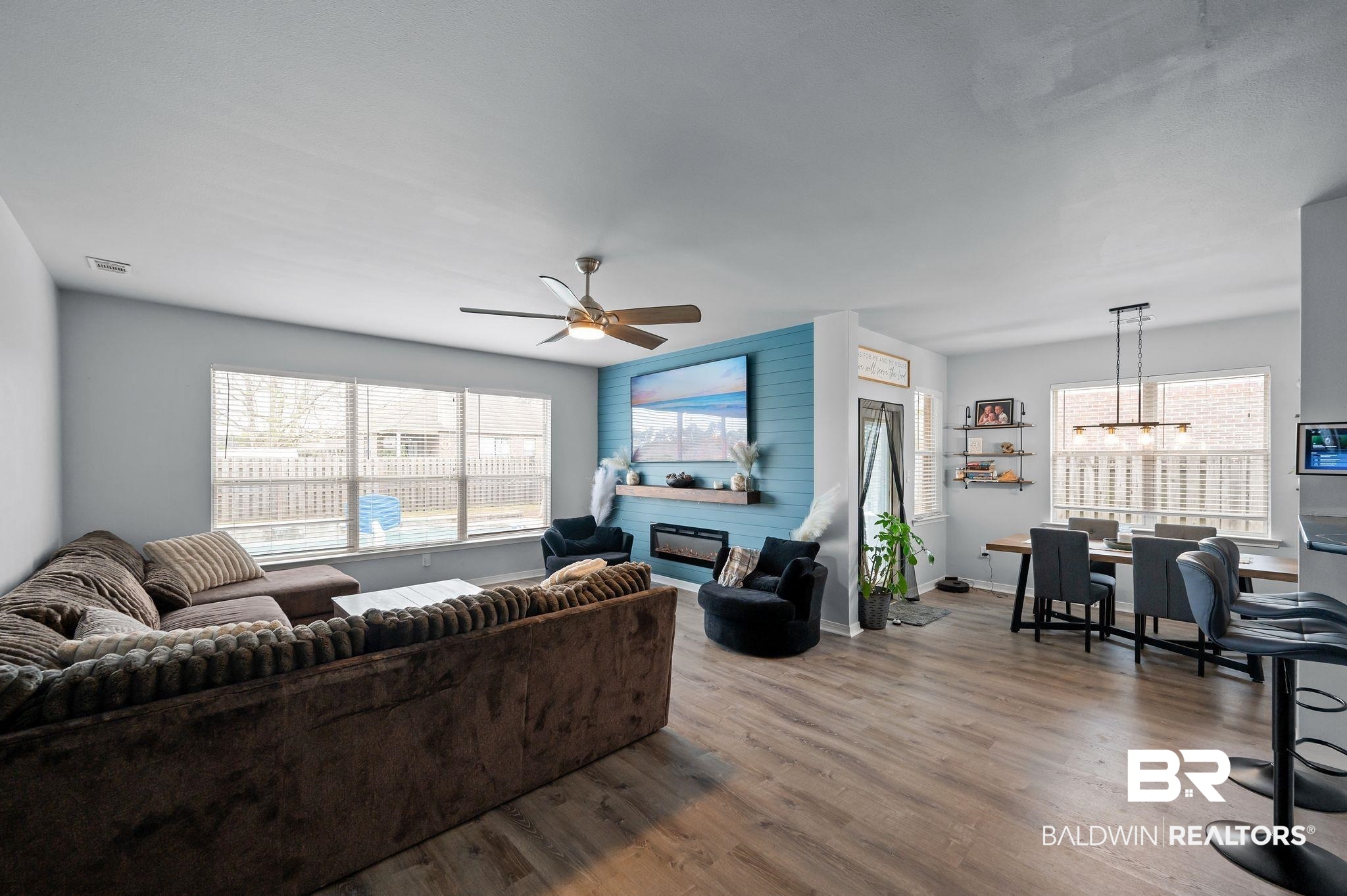 1287 Pembroke Way Foley, AL 36535 - Photo 8 of 39 Living area featuring ceiling fan, wood finished floors, suspended lighting, and a large fireplace