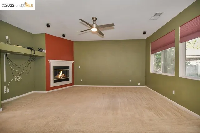 a view of a kitchen with a sink and cabinets