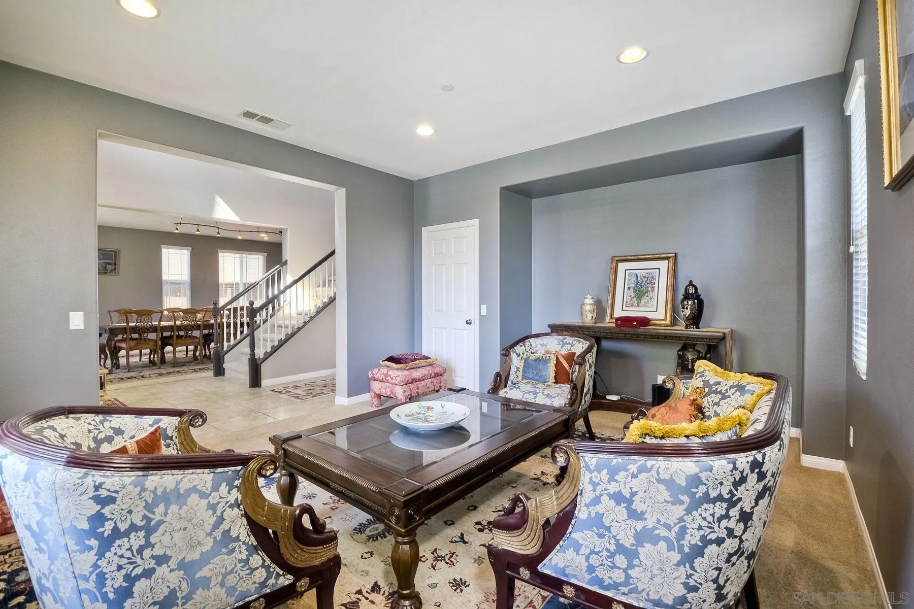 17161 Ralphs Ranch Road San Diego, CA 92127 - Photo 8 of 24 a living room with furniture and a table