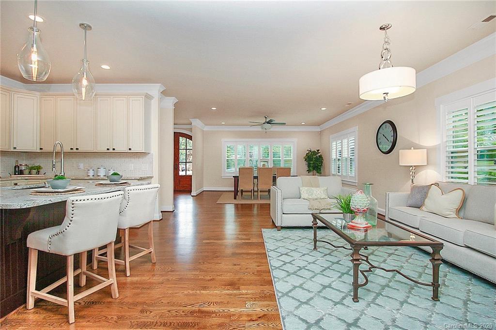132 Scofield Road Charlotte, NC 28209 - Photo 11 of 44 a living room with lots of furniture and view of kitchen