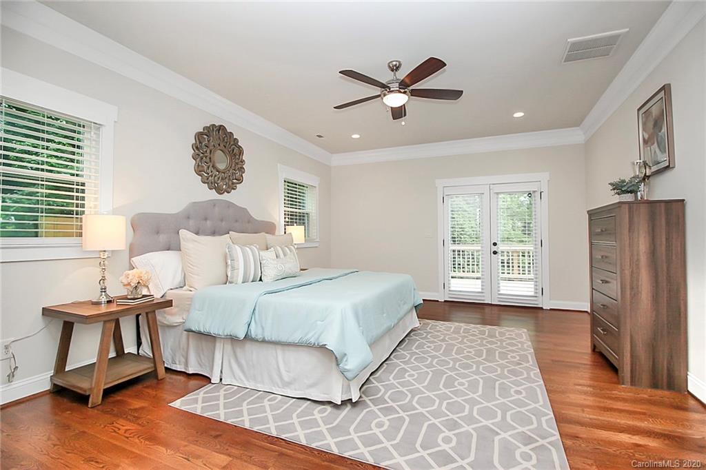 132 Scofield Road Charlotte, NC 28209 - Photo 18 of 44 a bedroom with a bed and a window
