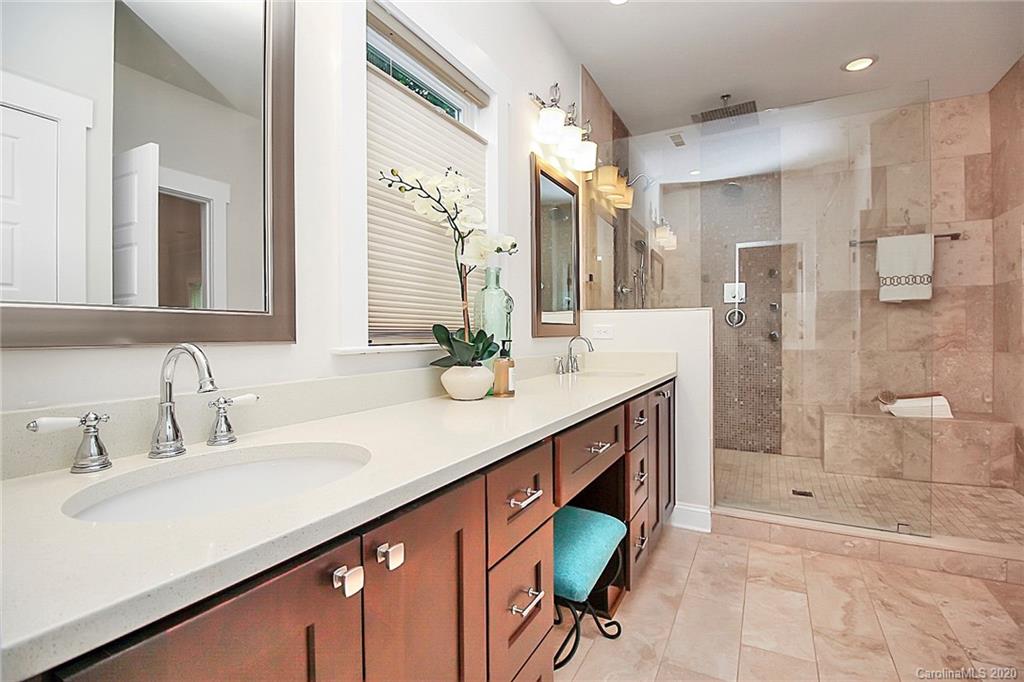 132 Scofield Road Charlotte, NC 28209 - Photo 20 of 44 a bathroom with a double vanity sink mirror and shower