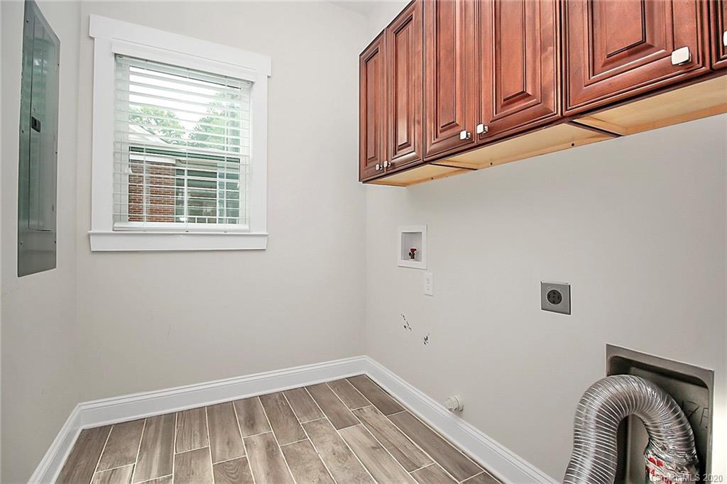 132 Scofield Road Charlotte, NC 28209 - Photo 26 of 44 a view of a room with wooden floor and window