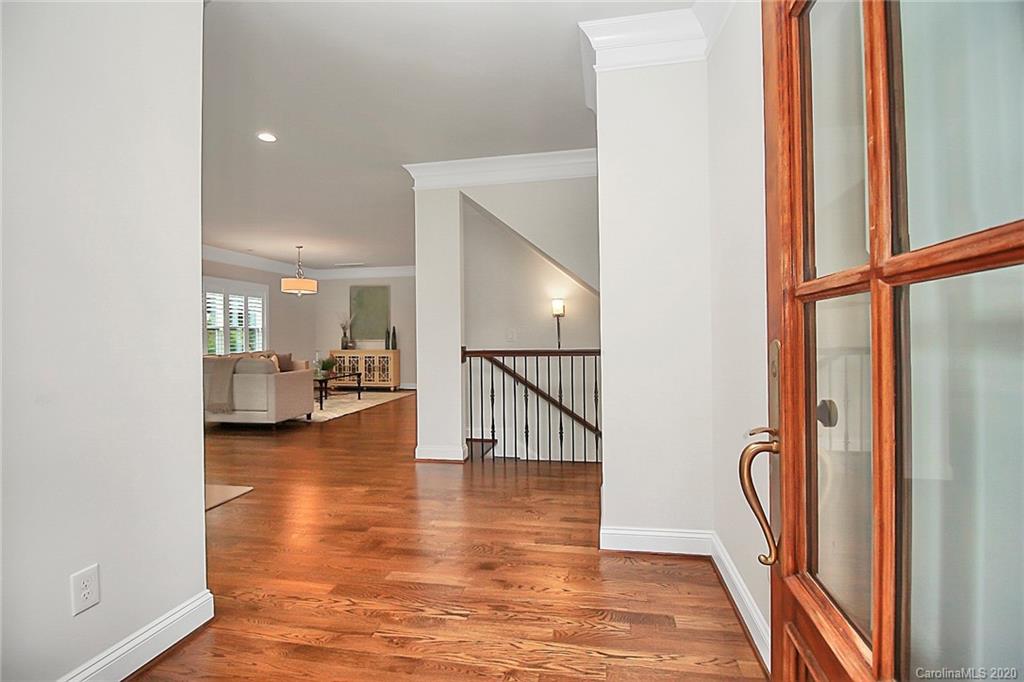 132 Scofield Road Charlotte, NC 28209 - Photo 4 of 44 a view of a hallway with furniture and staircase
