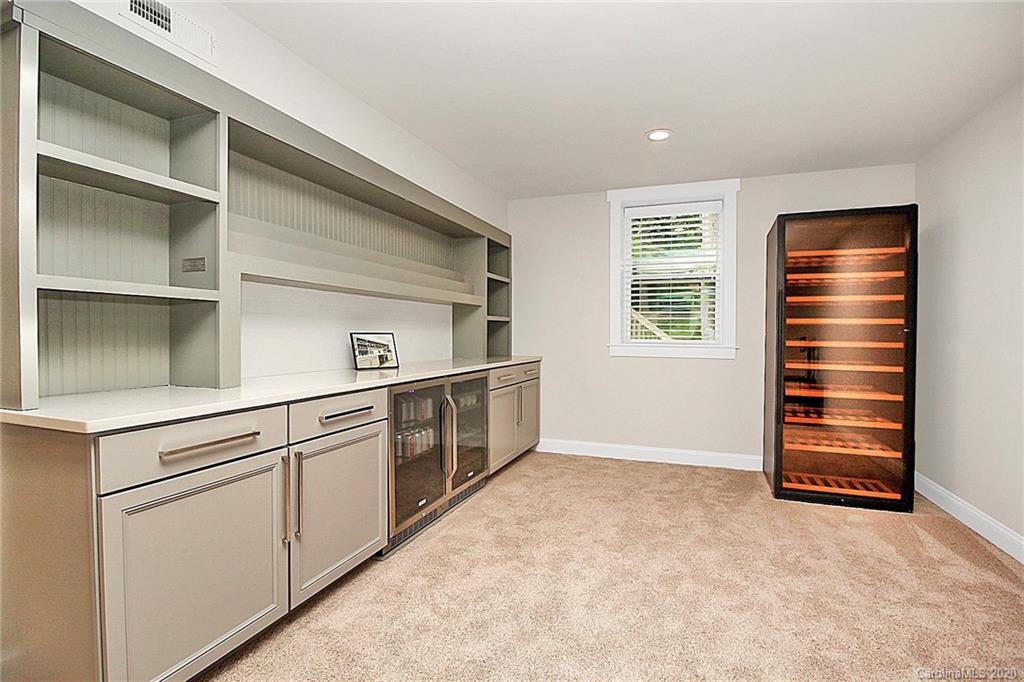 132 Scofield Road Charlotte, NC 28209 - Photo 31 of 44 a view of kitchen with cabinets and window