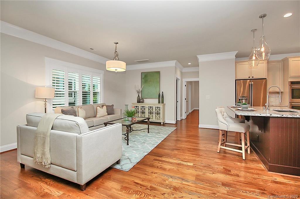 132 Scofield Road Charlotte, NC 28209 - Photo 9 of 44 a living room with furniture and wooden floor