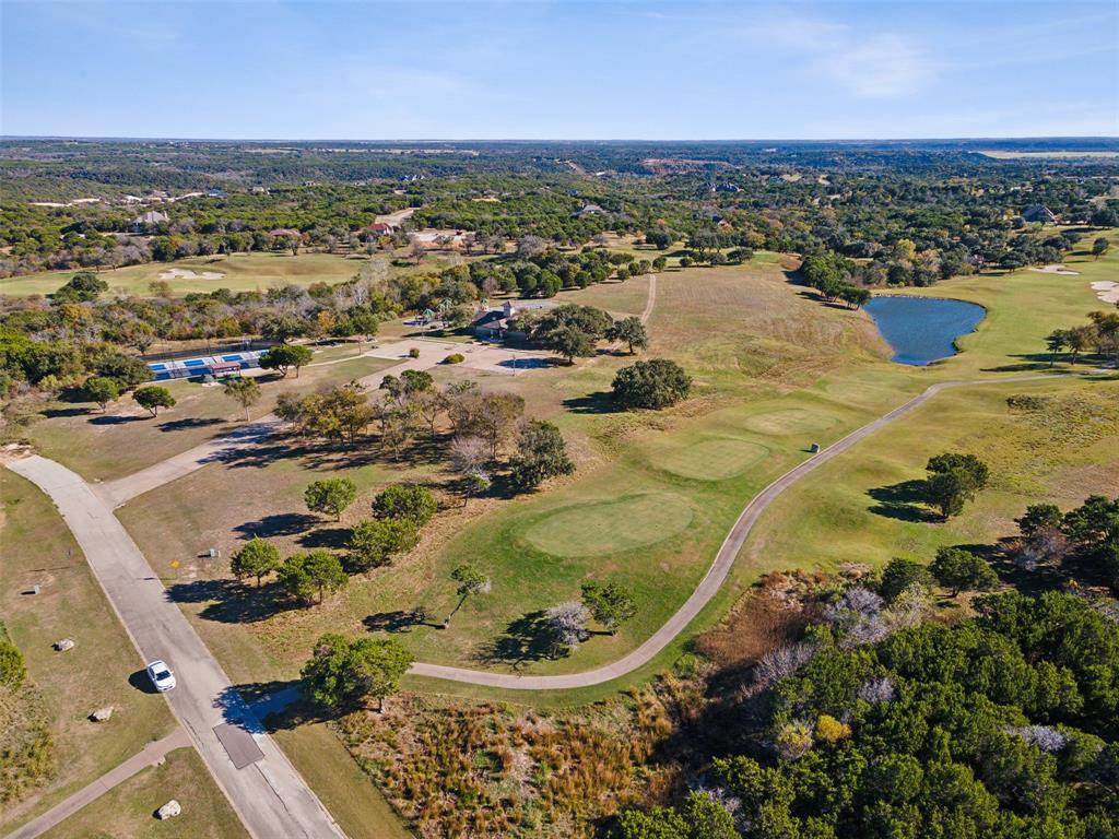 7301 Retreat Boulevard Cleburne, TX 76033 - Photo 31 of 40 an aerial view of residential houses with outdoor space