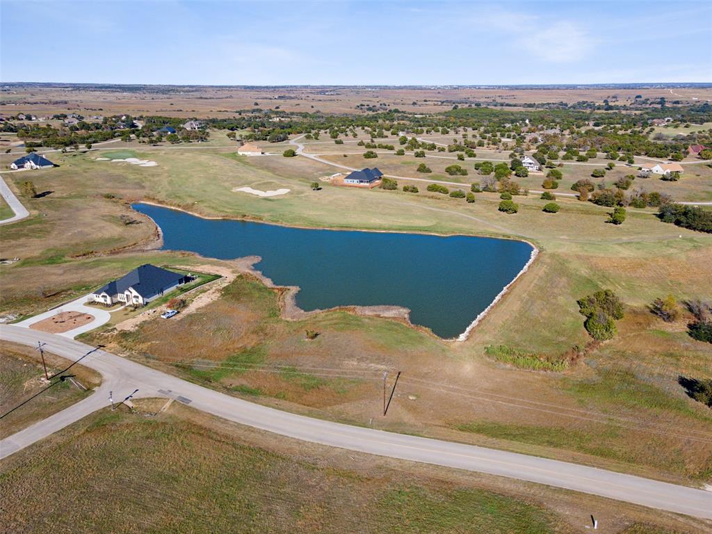 7301 Retreat Boulevard Cleburne, TX 76033 - Photo 33 of 40 an aerial view of residential houses with outdoor space