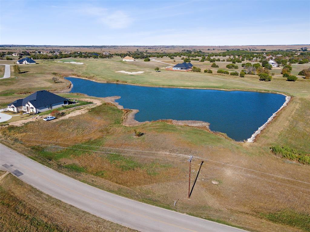 7301 Retreat Boulevard Cleburne, TX 76033 - Photo 6 of 40 a view of a lake with a ocean view