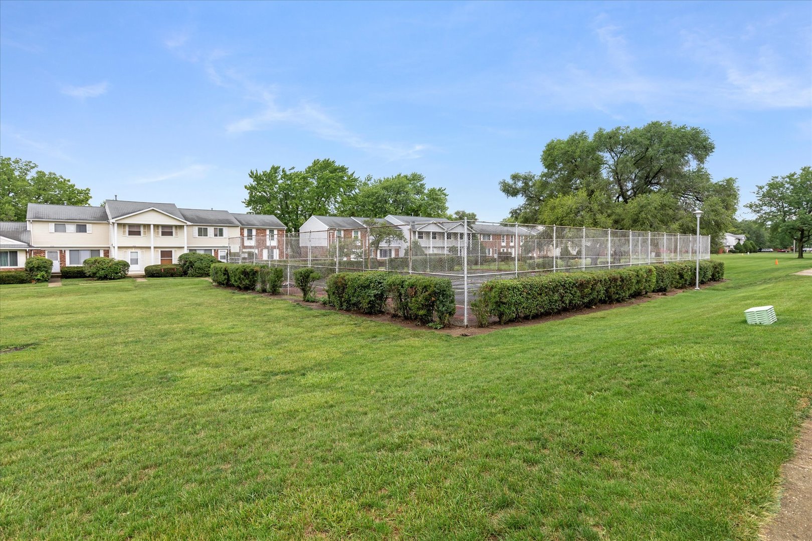 465 Mallview Lane Bolingbrook, IL 60440 - Photo 18 of 26 a view of a big yard with a house in the background