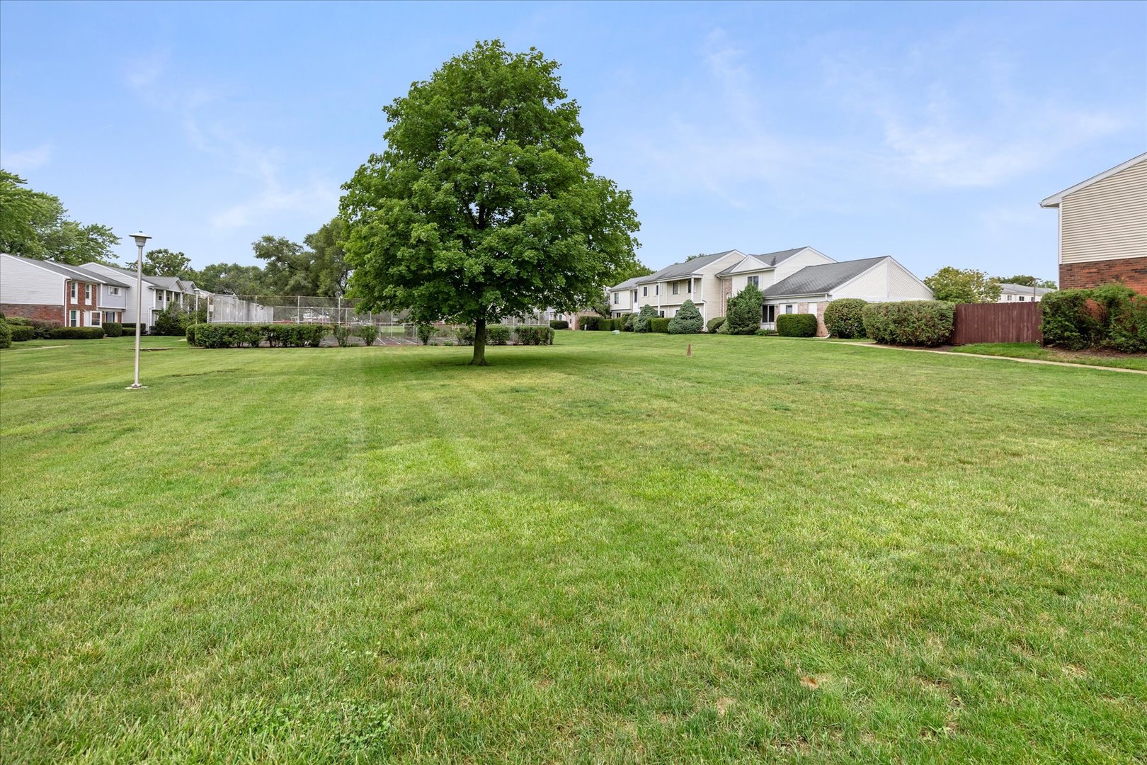 465 Mallview Lane Bolingbrook, IL 60440 - Photo 20 of 26 a view of a green field with house in the background