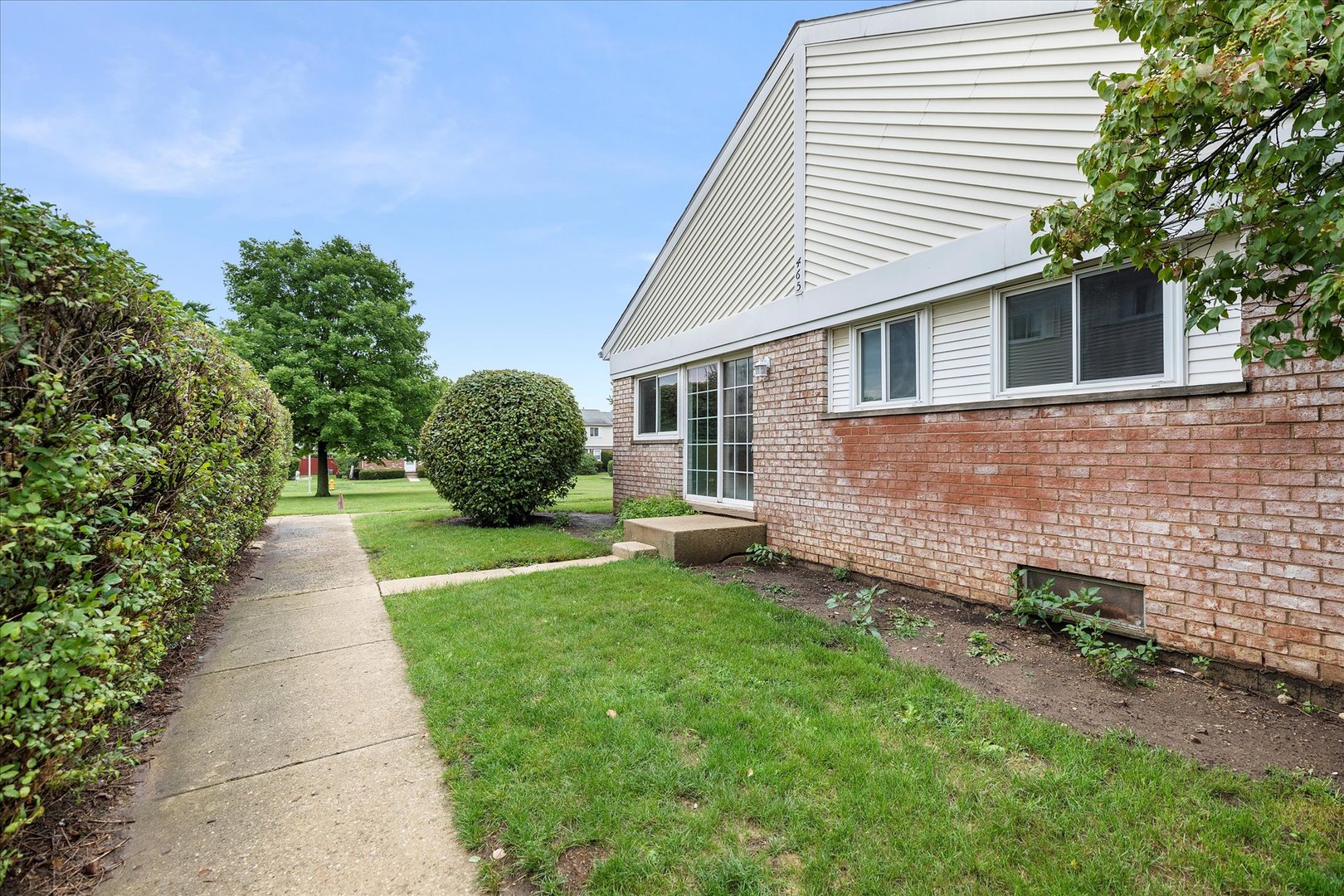 465 Mallview Lane Bolingbrook, IL 60440 - Photo 2 of 26 a view of a back yard of the house