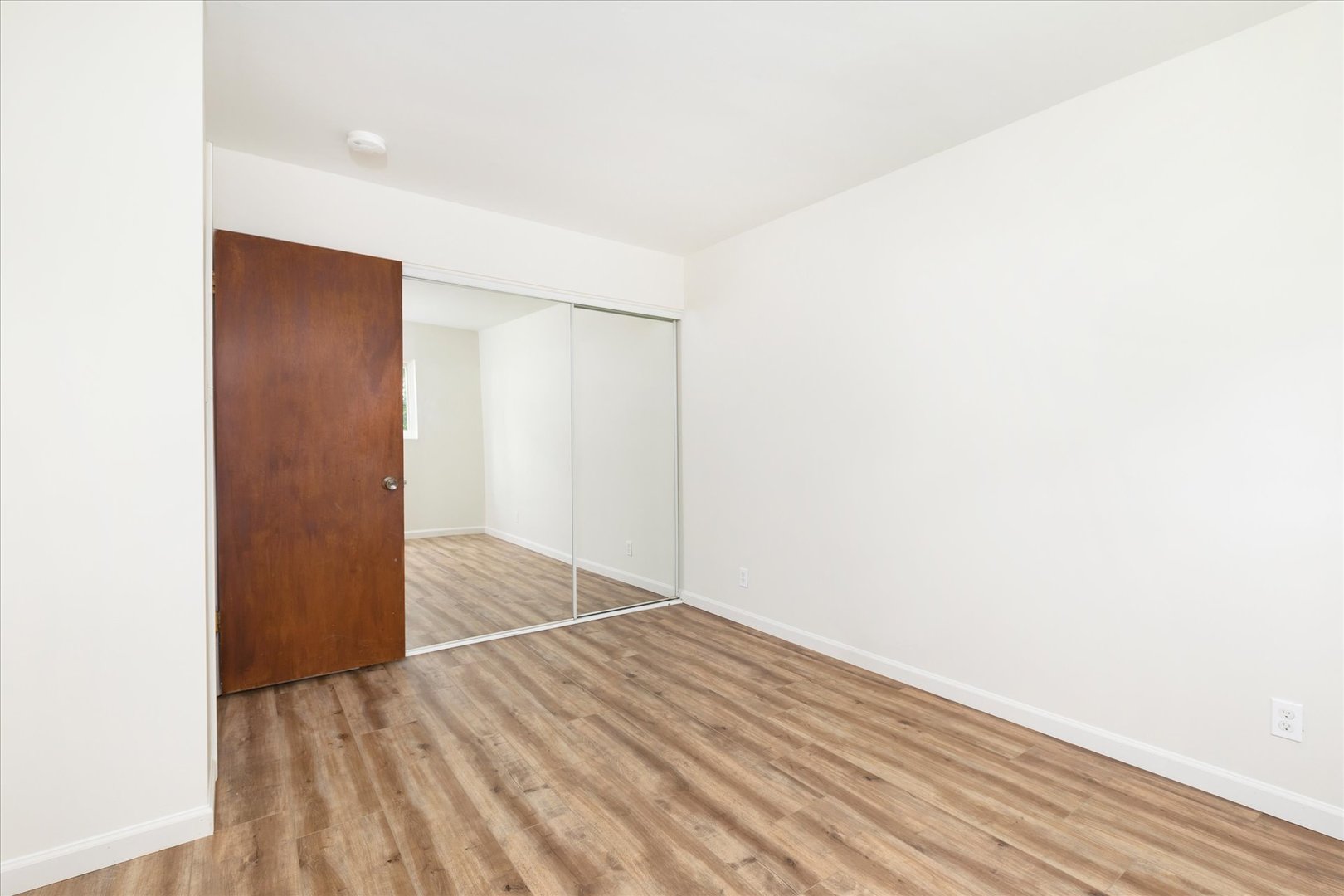 465 Mallview Lane Bolingbrook, IL 60440 - Photo 9 of 26 a view of empty room with wooden floor
