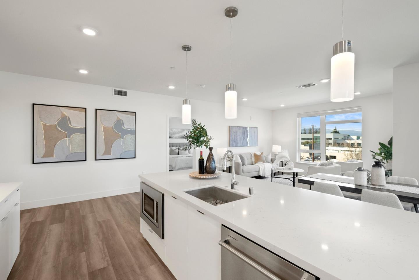 3578 Rambla Place, Unit 311 Santa Clara, CA 95051 - Photo 5 of 48 a kitchen with sink refrigerator and stove