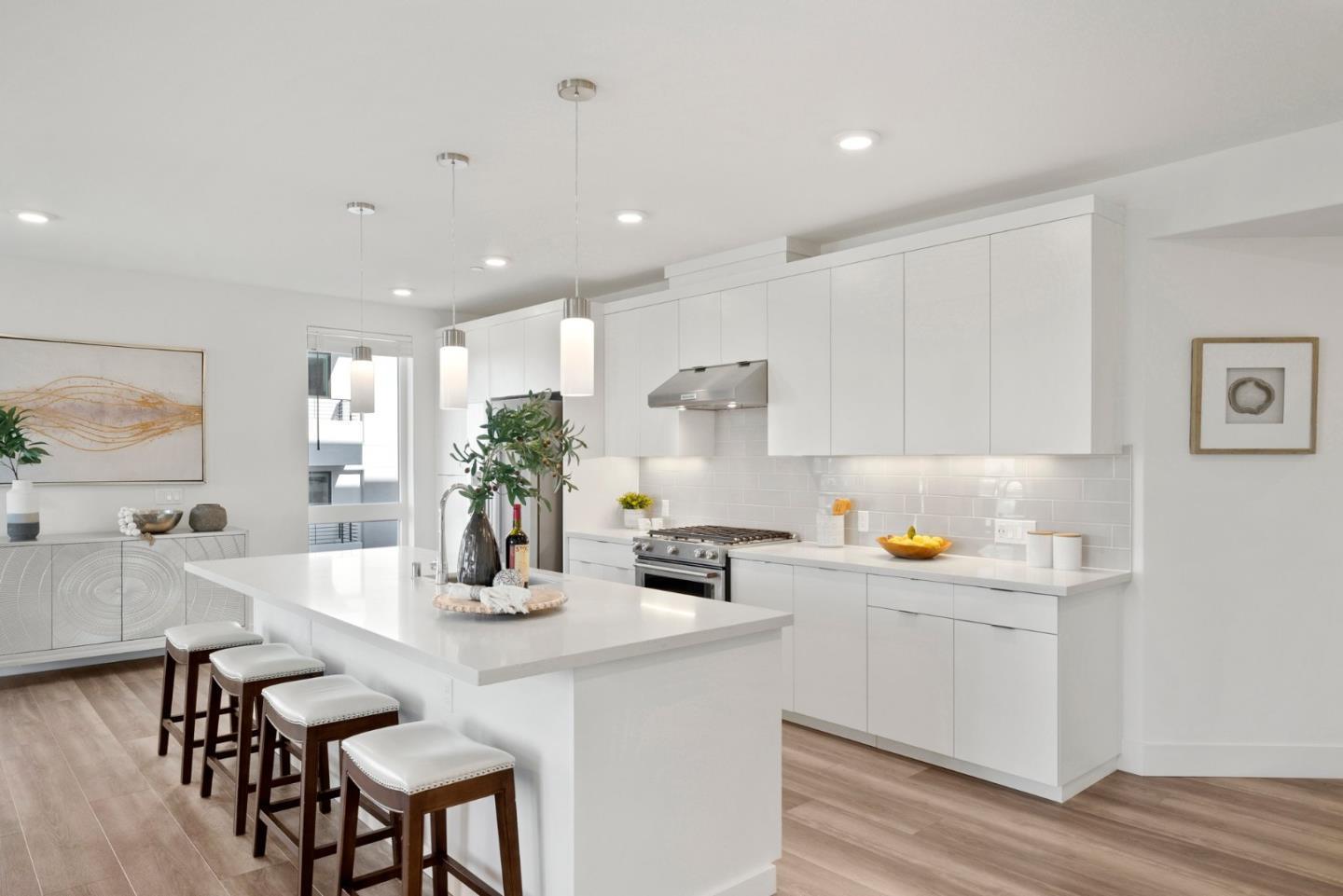 3578 Rambla Place, Unit 311 Santa Clara, CA 95051 - Photo 6 of 48 a kitchen with a sink cabinets and wooden floor