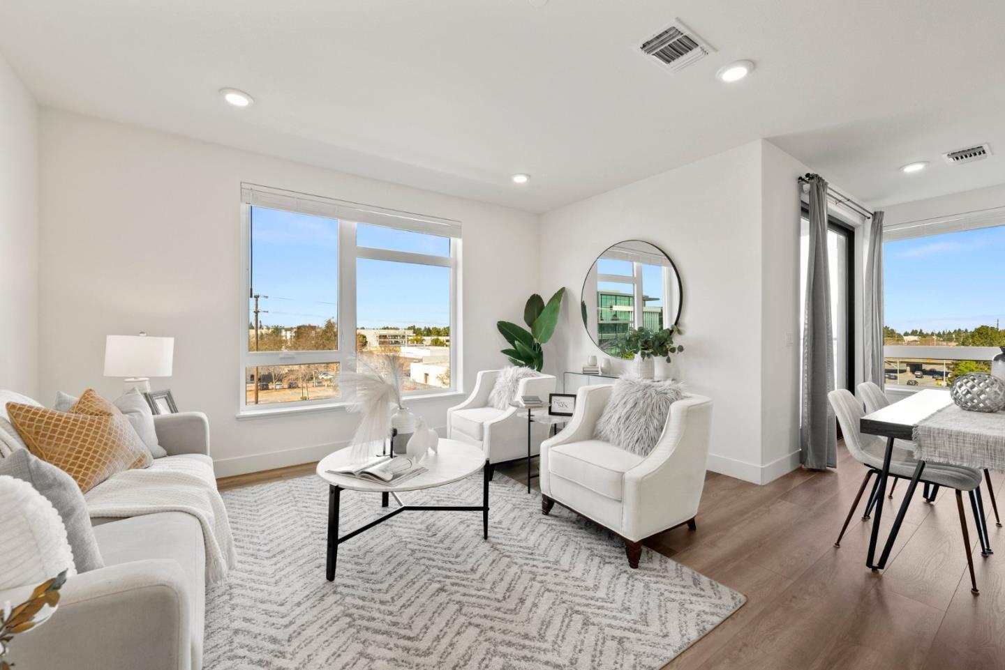 3578 Rambla Place, Unit 311 Santa Clara, CA 95051 - Photo 7 of 48 a living room with furniture and a large window