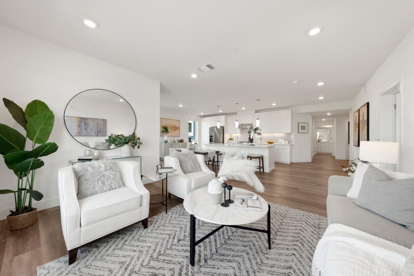 3578 Rambla Place, Unit 311 Santa Clara, CA 95051 - Photo 8 of 48 a living room with furniture a rug and a potted plant