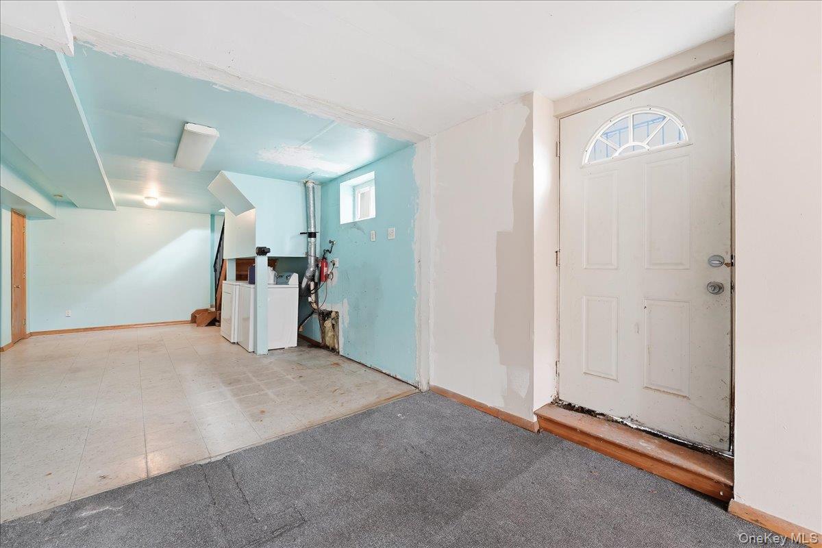 1050 Rensselaer Avenue Staten Island, NY 10309 - Photo 13 of 24 a view of a livingroom with a staircase