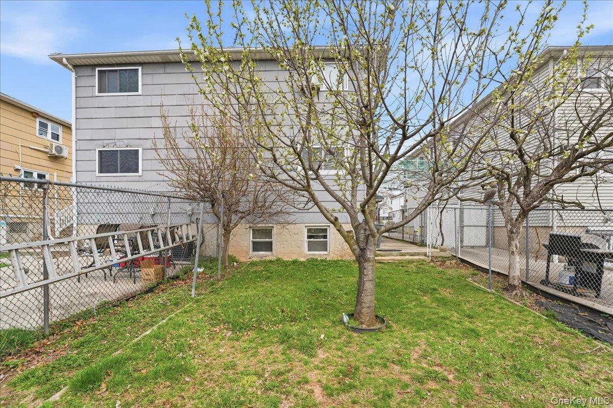 1050 Rensselaer Avenue Staten Island, NY 10309 - Photo 23 of 24 a view of a house with a yard