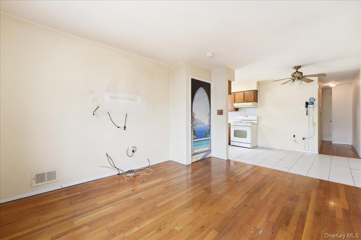 1050 Rensselaer Avenue Staten Island, NY 10309 - Photo 10 of 24 a view of empty room with wooden floor
