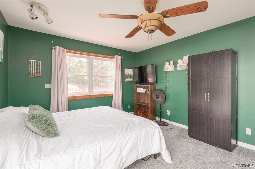 122 Fairview Road Louisa, VA 23093 - Photo 20 of 39 a bedroom with a bed dresser and a window