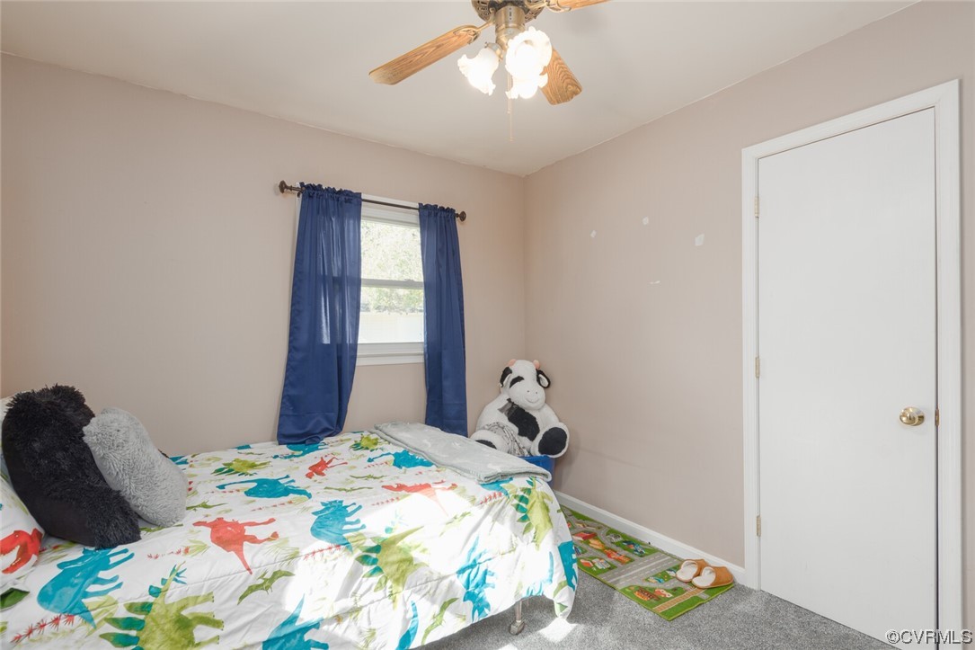 122 Fairview Road Louisa, VA 23093 - Photo 24 of 39 a bedroom with a bed and a window