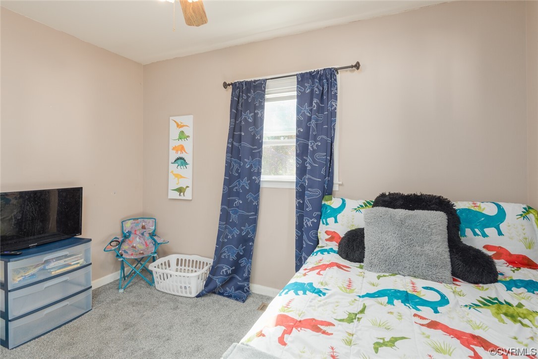 122 Fairview Road Louisa, VA 23093 - Photo 25 of 39 a bedroom with a bed and a tv